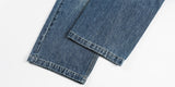 DAXUEN Distressed wide-leg jeans with pyramid studs