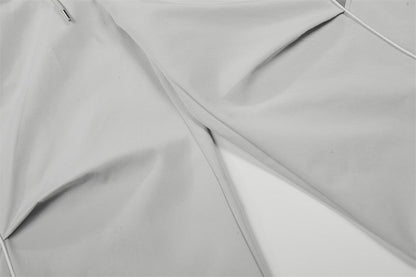 DAXUEN Wide-leg track pants with geometric color-blocked panels