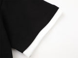 DAXUEN Embroidered graphic polo shirt in black and light grey marl