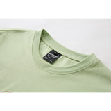 DAXUEN Short-sleeved graphic t-shirt with cat and flower design
