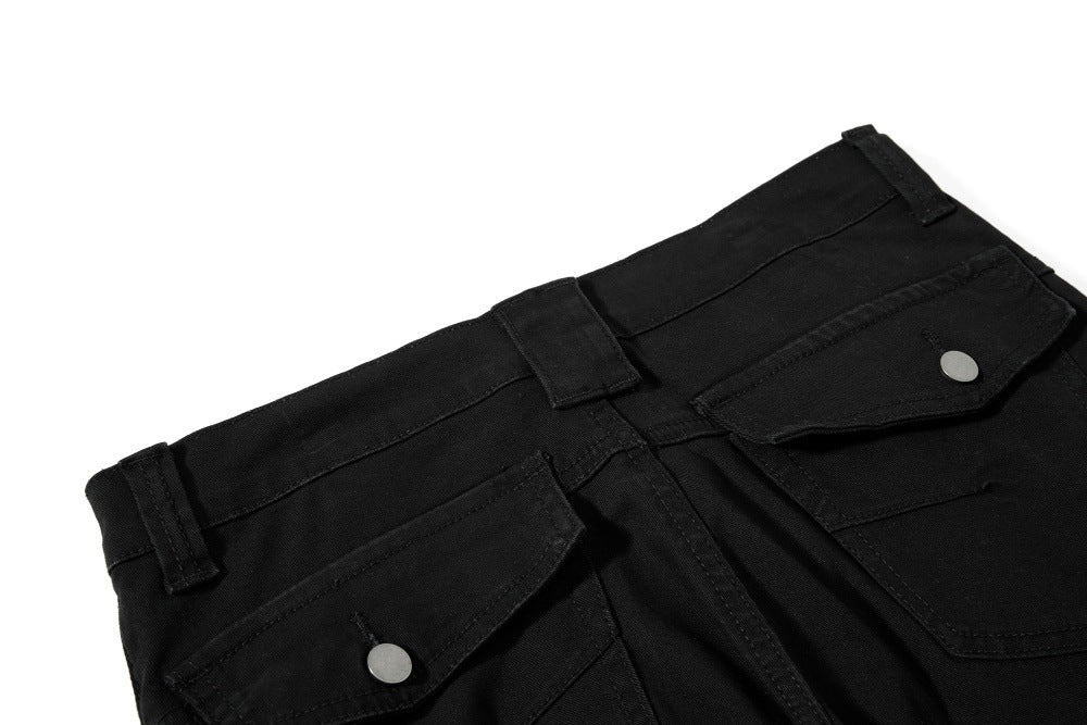 DAXUEN Black wide-leg pants with decorative zippers and studs