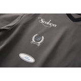 DAXUEN Graphic V-neck t-shirt with embroidered designs