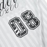 DAXUEN Short-sleeved polo shirt with vertical stripes and graphic text
