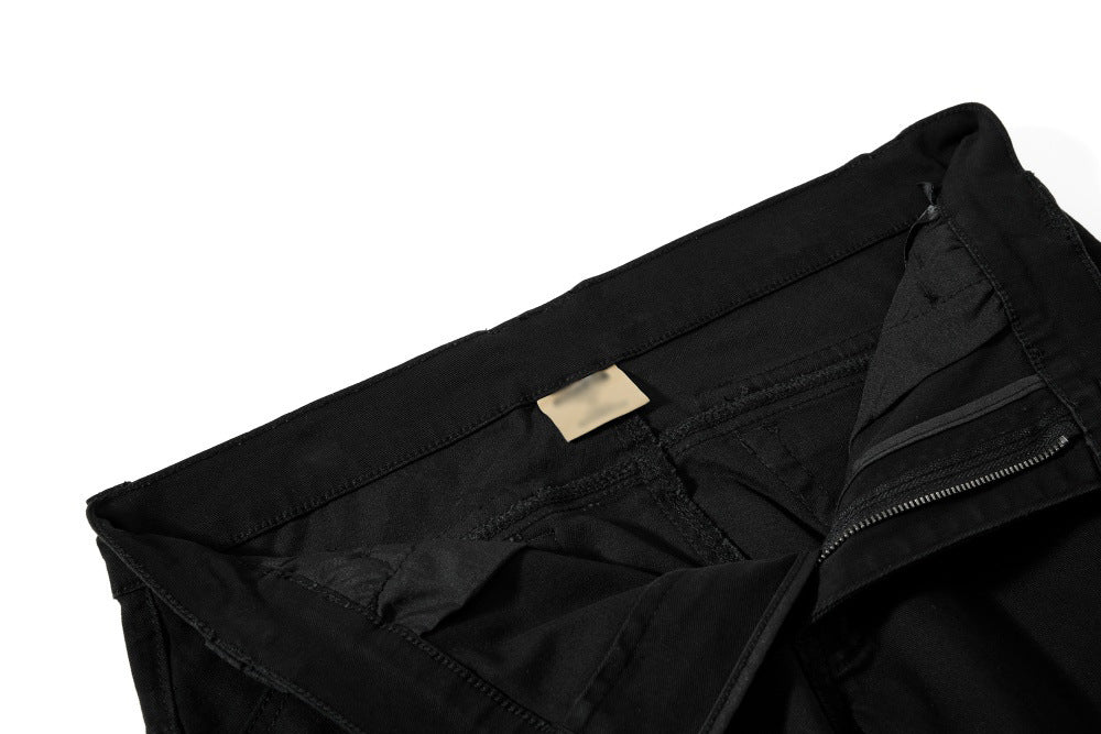 DAXUEN Black wide-leg pants with decorative zippers and studs