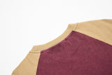 DAXUEN Distressed vintage graphic t-shirt with raglan sleeves