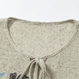 Dark Botanical Print V-Neck Knit Top
