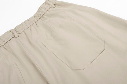 DAXUEN Loose-fitting wide-leg trousers in black and light beige