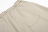 DAXUEN Loose-fitting wide-leg trousers in black and light beige