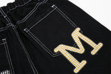 DAXUEN Black wide-leg denim shorts with appliqué details