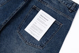DAXUEN Distressed wide-leg knee-length denim shorts