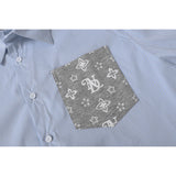 DAXUEN Light blue short-sleeved button-up shirt with pinstripes