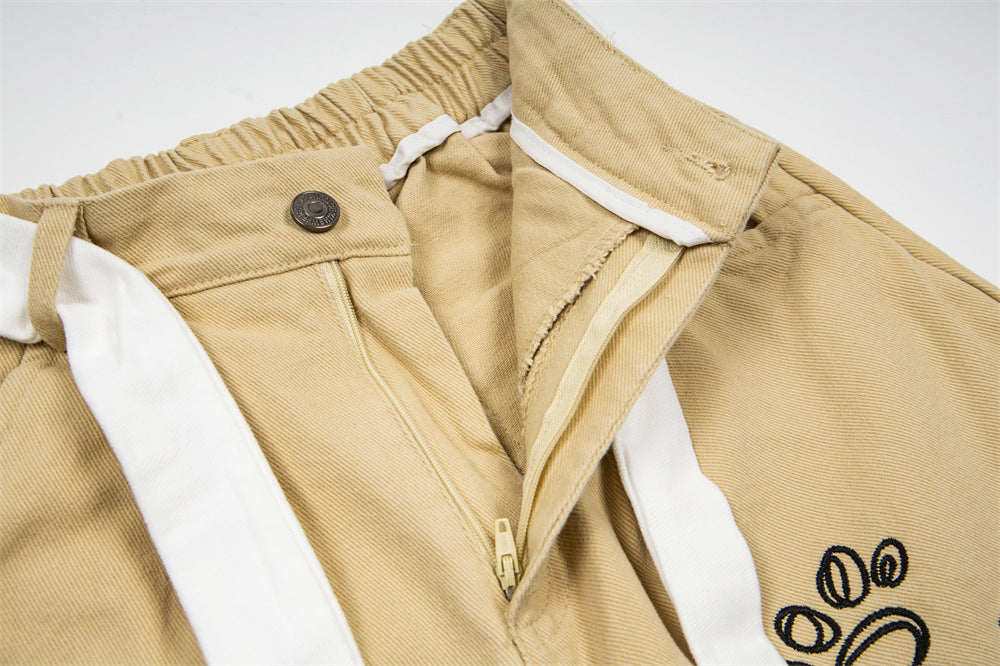 DAXUEN Khaki wide-leg trousers with whimsical graphics