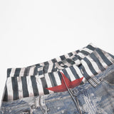 DAXUEN light-to-medium blue distressed wide-leg star print jeans