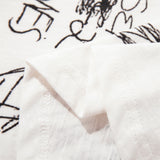 DAXUEN Light cream graphic T-shirt with chaotic print