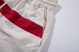 DAXUEN Loose-fitting wide-leg track pants with red graphics
