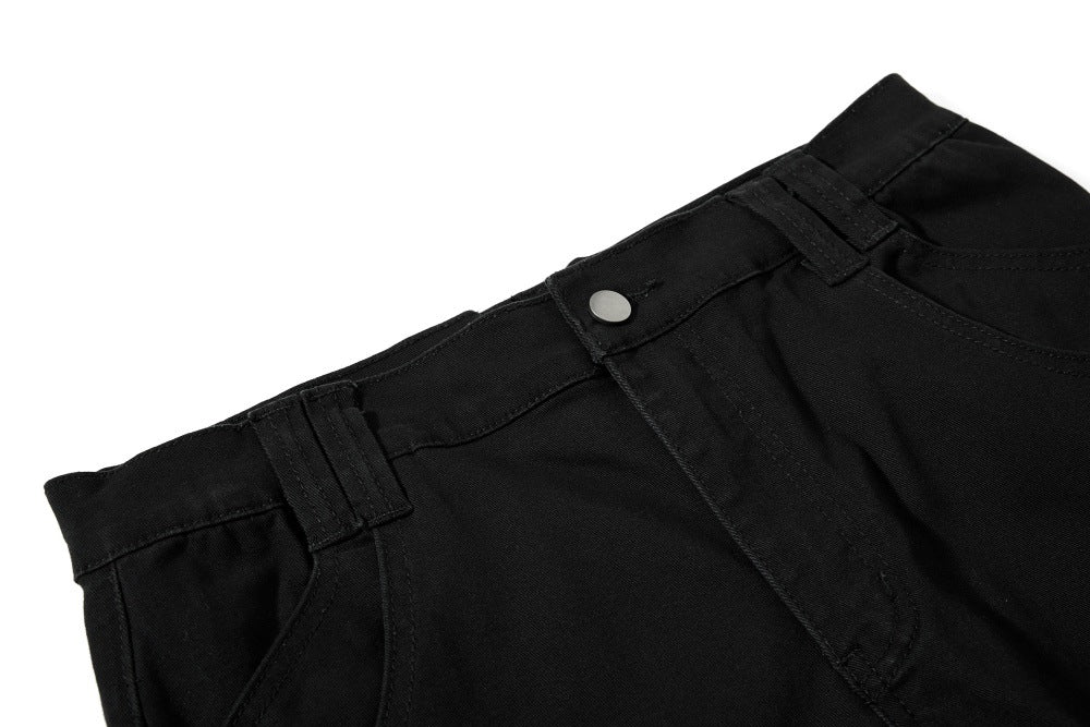 DAXUEN Black wide-leg pants with decorative zippers and studs