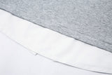 DAXUEN Layered oversized V-neck top with contrasting collar