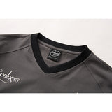 DAXUEN Graphic V-neck t-shirt with embroidered designs