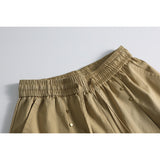 DAXUEN Wide-leg relaxed shorts with studs