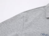DAXUEN Short-sleeve polo shirt with striped details and embroidery