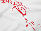 DAXUEN Ornate script embroidered polo shirt