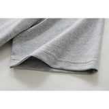 DAXUEN Short-sleeved relaxed-fit polo shirt with faux layered design