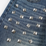 DAXUEN Distressed wide-leg jeans with pyramid studs