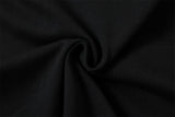 DAXUEN Short-sleeved black t-shirt with metal eyelet graphic