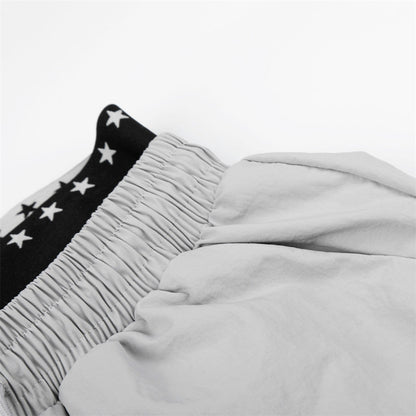 DAXUEN Wide-leg track pants with star graphics