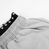 DAXUEN Wide-leg track pants with star graphics