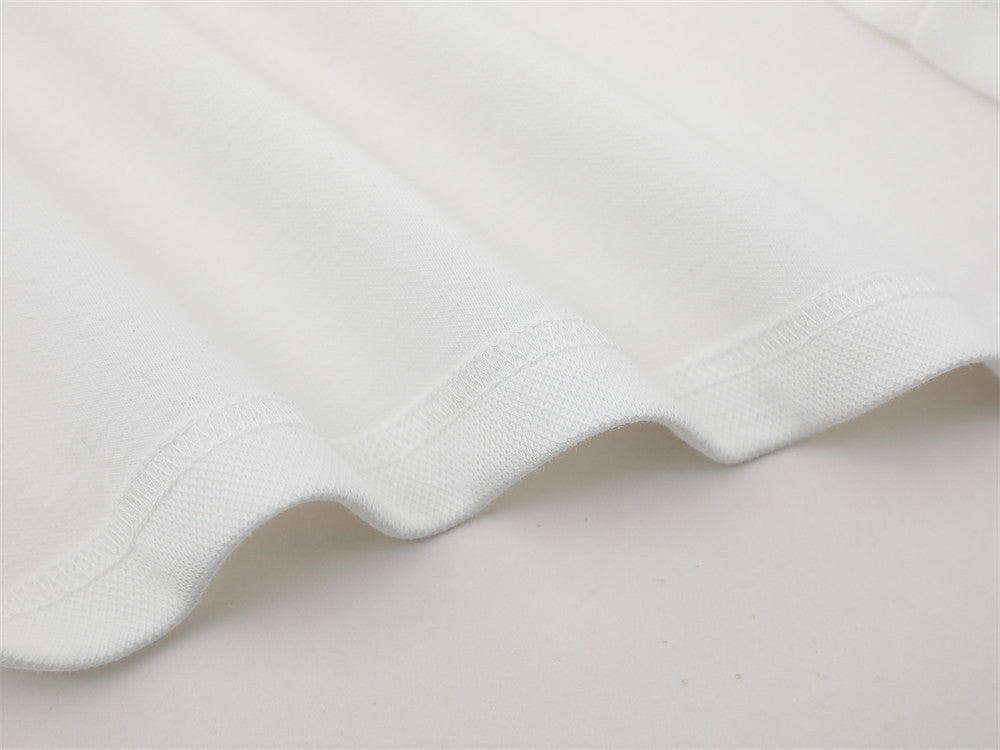 DAXUEN Short-sleeved loose-fitting polo shirt with embroidery