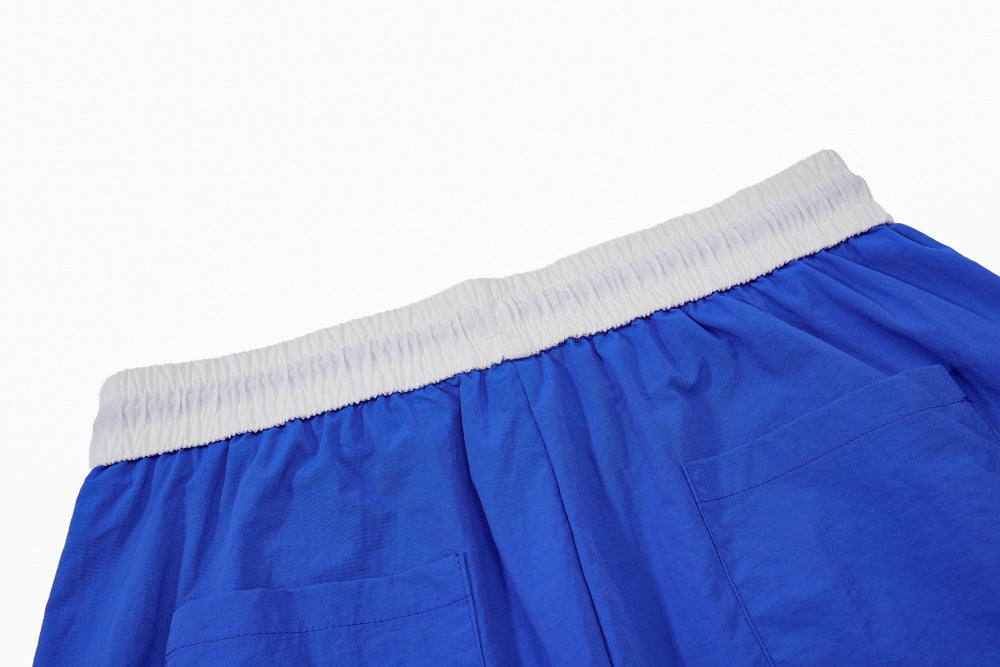 DAXUEN Oversized wide-leg track pants with graphic prints