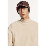DAXUEN muted olive embossed graphic long-sleeve top
