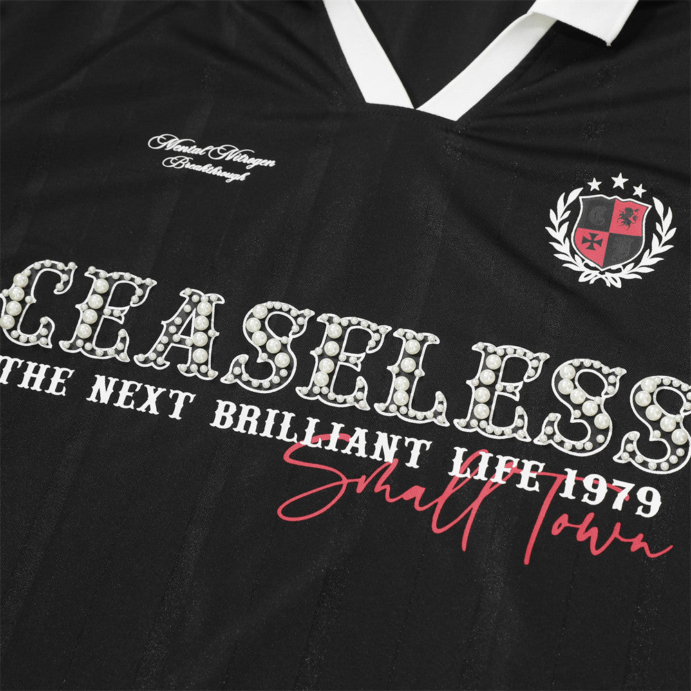 DAXUEN V-neck short-sleeved jersey top with graphic elements