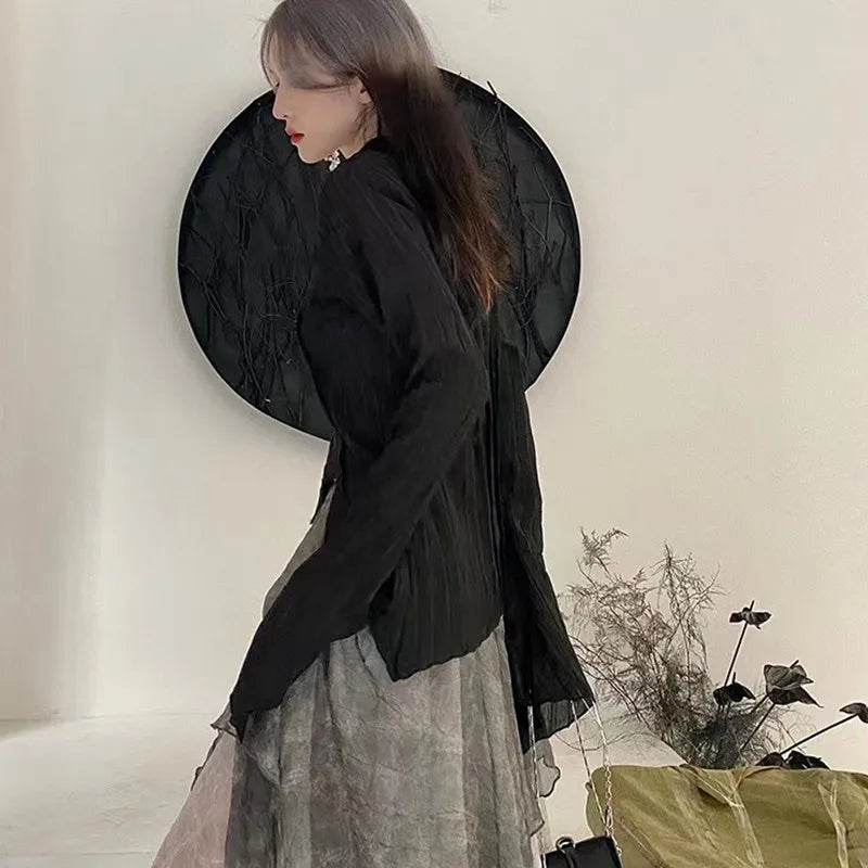 Model wearing the black Gothic Whisper Asymmetrical Shirt