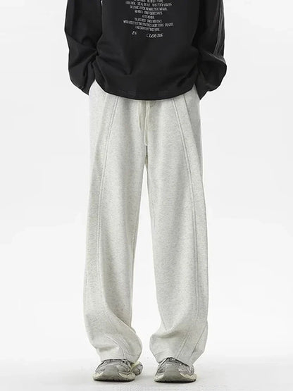 Front view of the gray Loose Fit Pleated Sweatpants