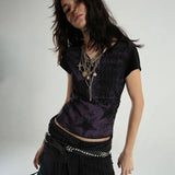 Model wearing the black purple Graphic Short-Sleeve T-Shirt 