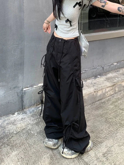 Model wearing the black Tailored Cargo Utility Pants