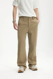 Model wearing the khaki Men's Straight-Leg Chino Pants