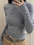Model wearing the gray Modern Maven Top