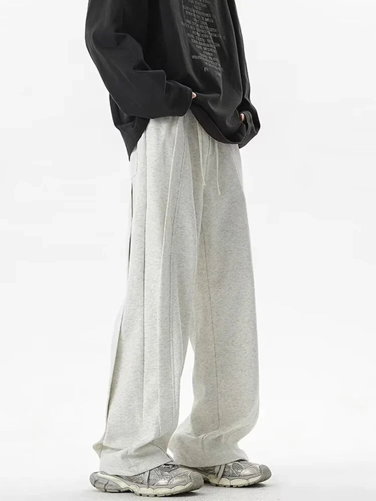 Front view of the gray Loose Fit Pleated Sweatpants