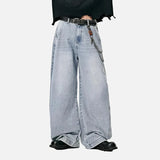 Model wearing the light blue Vintage Wid-Leg Denim Jeans in a gray background