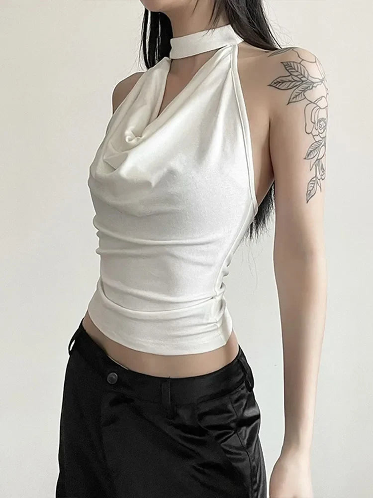 Model wearing the white Mystic Muse Halter Top