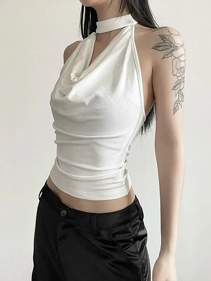 Model wearing the white Mystic Muse Halter Top