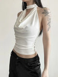 Model wearing the white Mystic Muse Halter Top