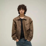 Model wearing the brown Wanderlust Trailblazer Jacket 