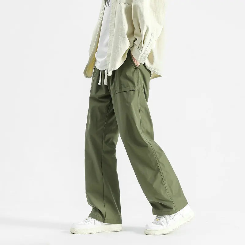 Model wearing the green Wide-Leg Drawstring Cargo Pants