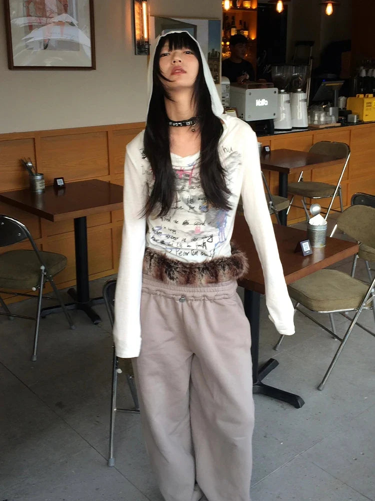 Model wearing the beige Text Print Hooded T-shirt