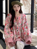 Model wearing the pink Floral Knit Buttoned Sweater