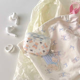 Front view of the Teddy Bear Bow Earbud Case